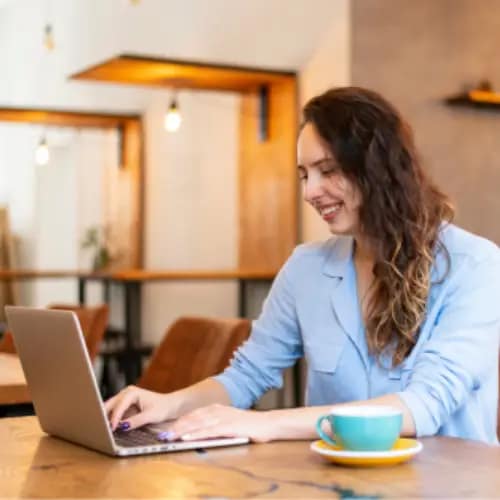 medium-shot-woman-typing-laptop